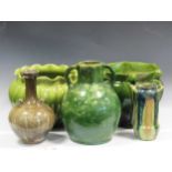 A collection of green glazed studio pottery to include a Bretby jardiniere