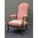 A 19th century French reclining Voltaire padded arm chair