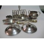 A collection of silverware including toast rack, tablespoons, waiter, salt etc together with a