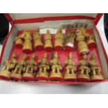 A Jerusalem olive wood carved figural chess set, varnished, height of kings about 14cm