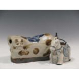 A Chinese provincial stoneware pillow as a cat, late Qing Dynasty/Republic, 24cm long