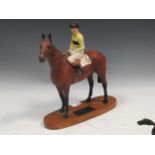 A Beswick Connoisseur model of Arkle with Pat Taffe up32 x 30cm. Provenance: Warren & Wignall,