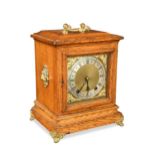 An oak case mantel clock, circa 1900,