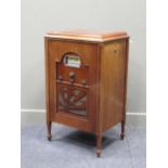 A gramophone cabinet, formerly with wind-up mechanism, now converted to electricty