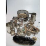 A collection of silver items including an armada style dish, two pierced dishes, condiments, 2