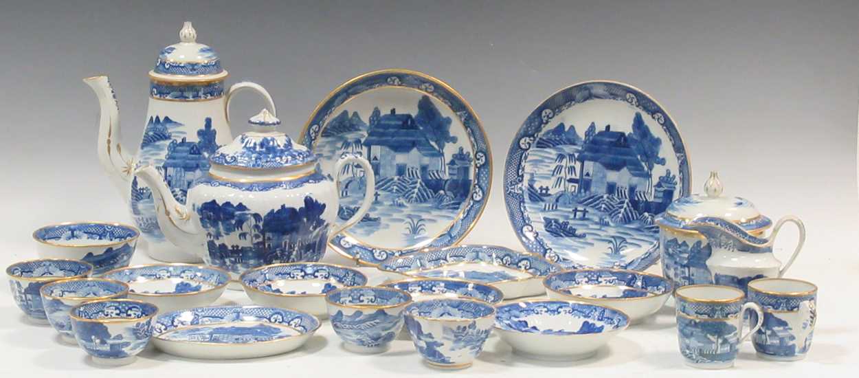 A collection of Newhall 'Trench Mortar' pattern tea and coffee wares, comprising two saucer