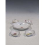 A group of 20th century Meissen; to include, two circular boxes and covers; a shaped oval dish;