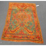 A late 19th/eary 20th century Ushak rug 150 x 94cm