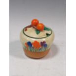 Clarice Cliff - a 'Crocus' pattern conserve pot and lidCondition report: Generally good condition.