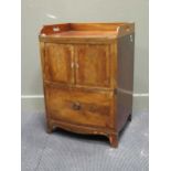 A 19th century mahogany bow fronted night cupboard/ bedside cabinet 81 x 56 x 50cmProvenance: