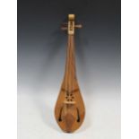 A small reproduction Rebec (bowed stringed instrument of the Medieval era)