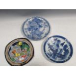 Two blue and white plates depicting floral and landscape scenes together with a Rosenthal
