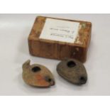 Two Roman pottery oil lamps