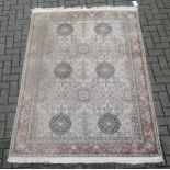 A Persian rug 216 x 150