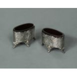A pair of 19th century German metalwares silver salts,
