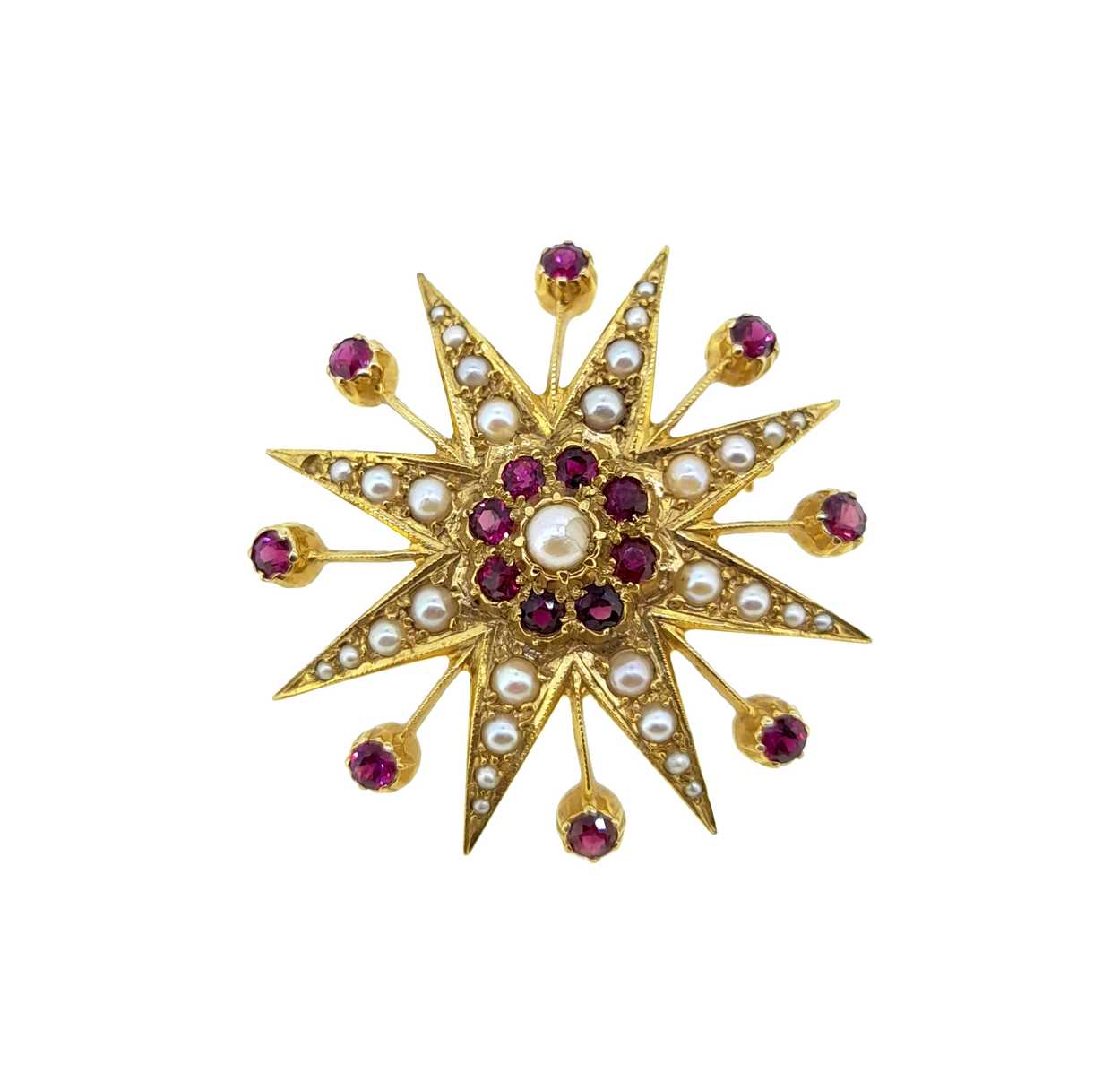 A ruby and pearl star brooch,