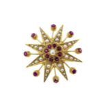 A ruby and pearl star brooch,