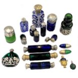 A collection of Victorian and later blue and green glass scent bottles,