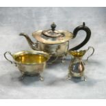 An early 20th century silver harlequin bachelor's three-piece tea set,