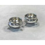 A pair of George II silver cauldron salts,