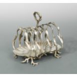 A Victorian silver substantial seven bar toast rack, mark of John Samuel Hunt,