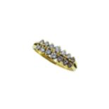 An 18ct gold two row diamond ring,