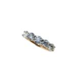 An 18ct rose gold five stone diamond ring,