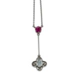 A ruby and diamond pendant and chain,