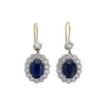 A pair of sapphire and diamond cluster ear pendants,