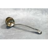 A George IV silver soup ladle,