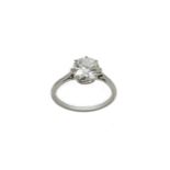 A diamond solitaire ring,