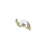 A cultured pearl and diamond ring,
