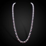 A single opera length row of Tahitian saltwater and Edison pink freshwater cultured pearls,