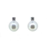 A pair of South Sea cultured pearl and diamond ear studs,