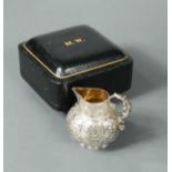 A Victorian silver miniature cream jug,