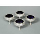 A set of four George V silver cauldron salts,