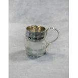 A George III 18th century silver christening mug,