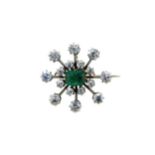 An early 20th century emerald and diamond brooch,