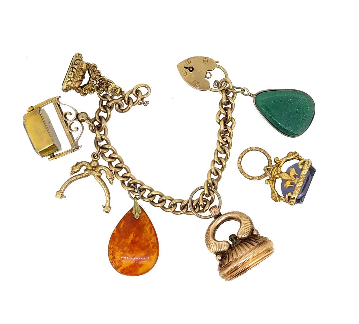 A late 20th century charm bracelet with assorted charms,