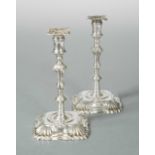 A pair of Victorian silver tapersticks,