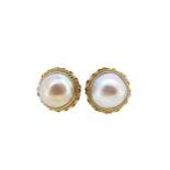 A pair of mabé pearl ear studs,