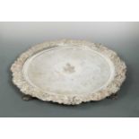 A large mid 19th century Old Sheffield Plate charger with later decoration,