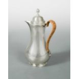 An Edward VII silver coffee or hot water pot,