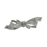 A diamond bow brooch,