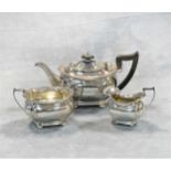 An Edward VII silver three-piece bachelor's tea set,