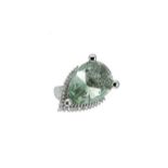 A modern green amethyst and diamond dress ring,