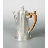 A mid 20th century silver coffee pot,