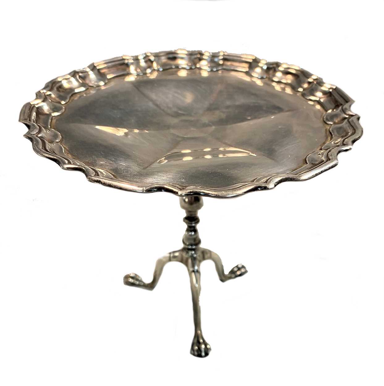 An early 20th century silver miniature tripod wine table,