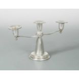 Dublin - A 20th century silver three light candelabra, together with a double ended spirit measure,