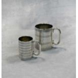 Two George V silver miniature tankards,